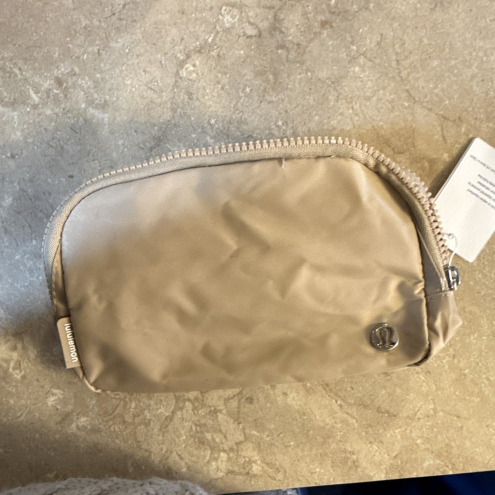Lululemon Beige Nylon Waist Pack Zip Closure Adjustable Size Hiking